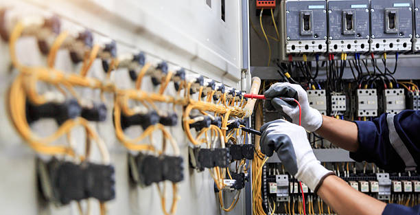 Professional Electrician technician working in Mauriceville, TX